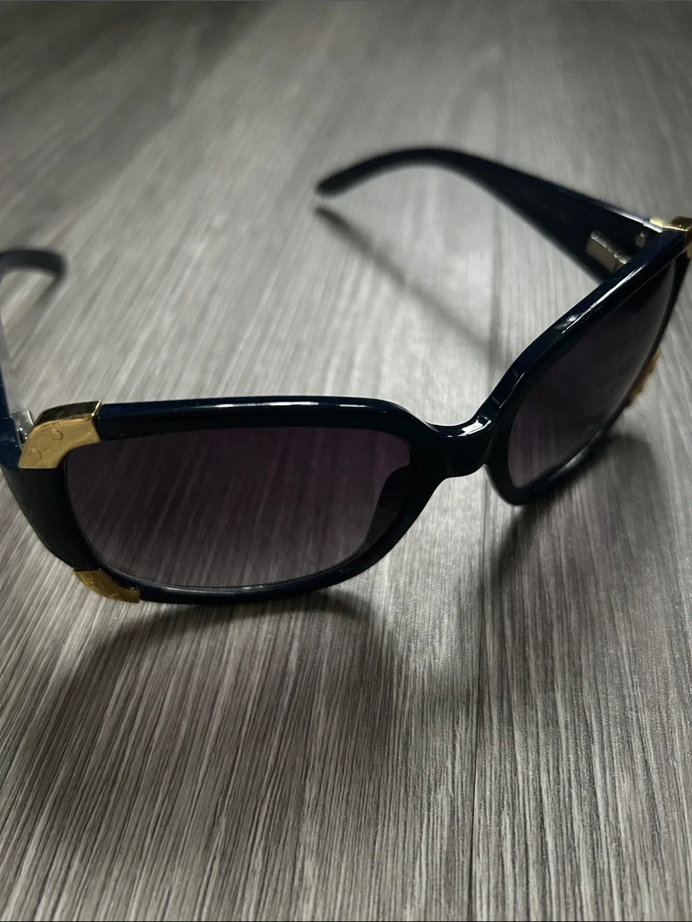 Curations Women’s Blue sunglasses with gold-tone corner accents